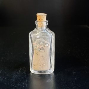brick dust vial