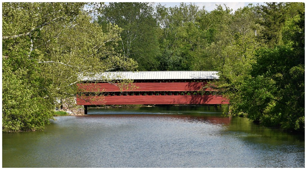 photo shows sachs covered bridge over the water