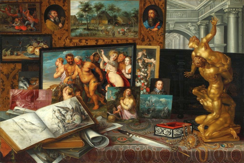 Thomas Gilcrease. Photo of a table with paintings, books and statues on it 