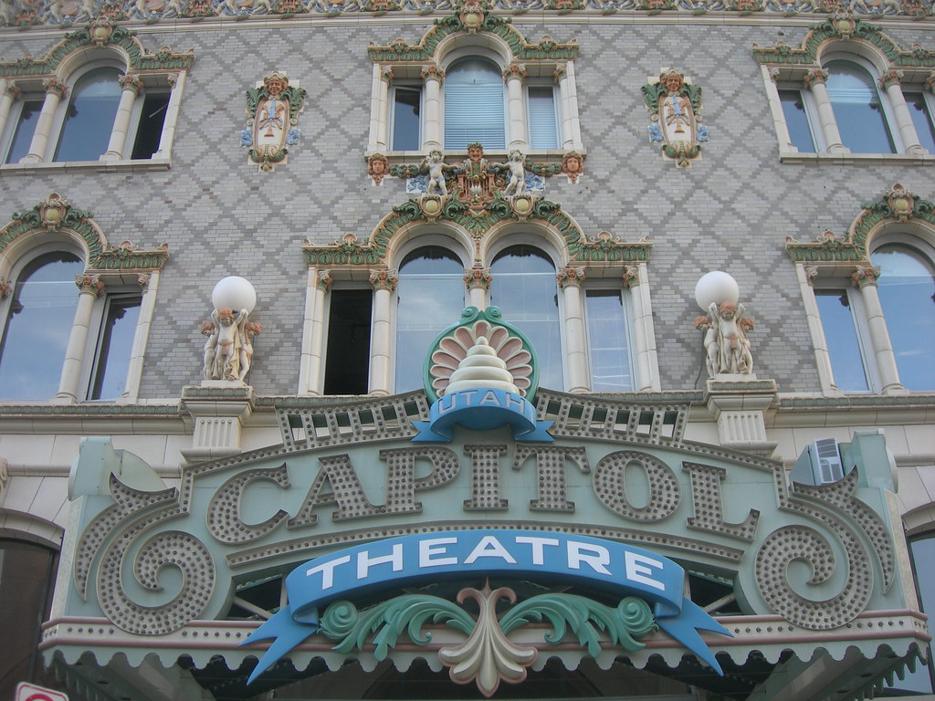 Elaborately designed building front that reads capitol theatre